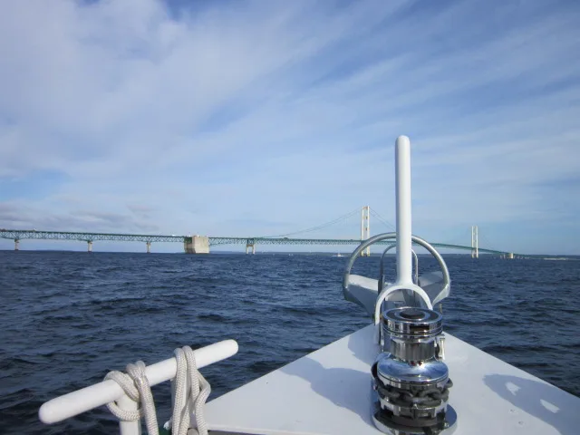 Sage's bow pointed toward the Mackinac Bridge beneath a gray sky